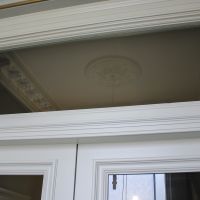 Bespoke decorative joinery to fan light and door surround