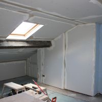 Restored top floor sloped ceiling walls