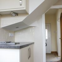 Redesigned under stairs kitchen area