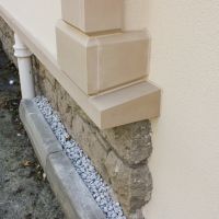 Detailed coin stone and plinth